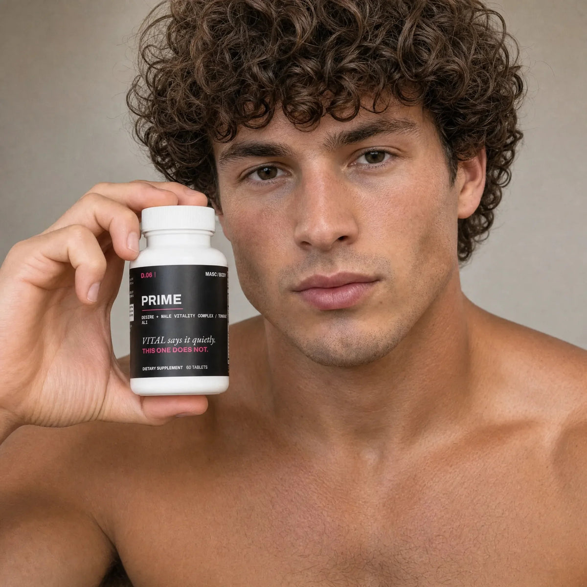 MASC/BODY PRIME desire + male vitality complex, tongkat ali — model holding the bottle